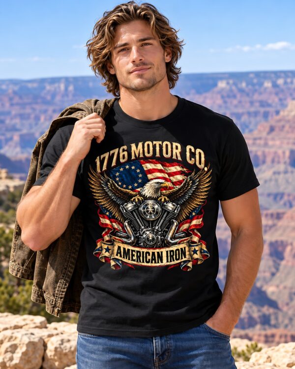 Man in a 1776 Motor Co. tee in a garage